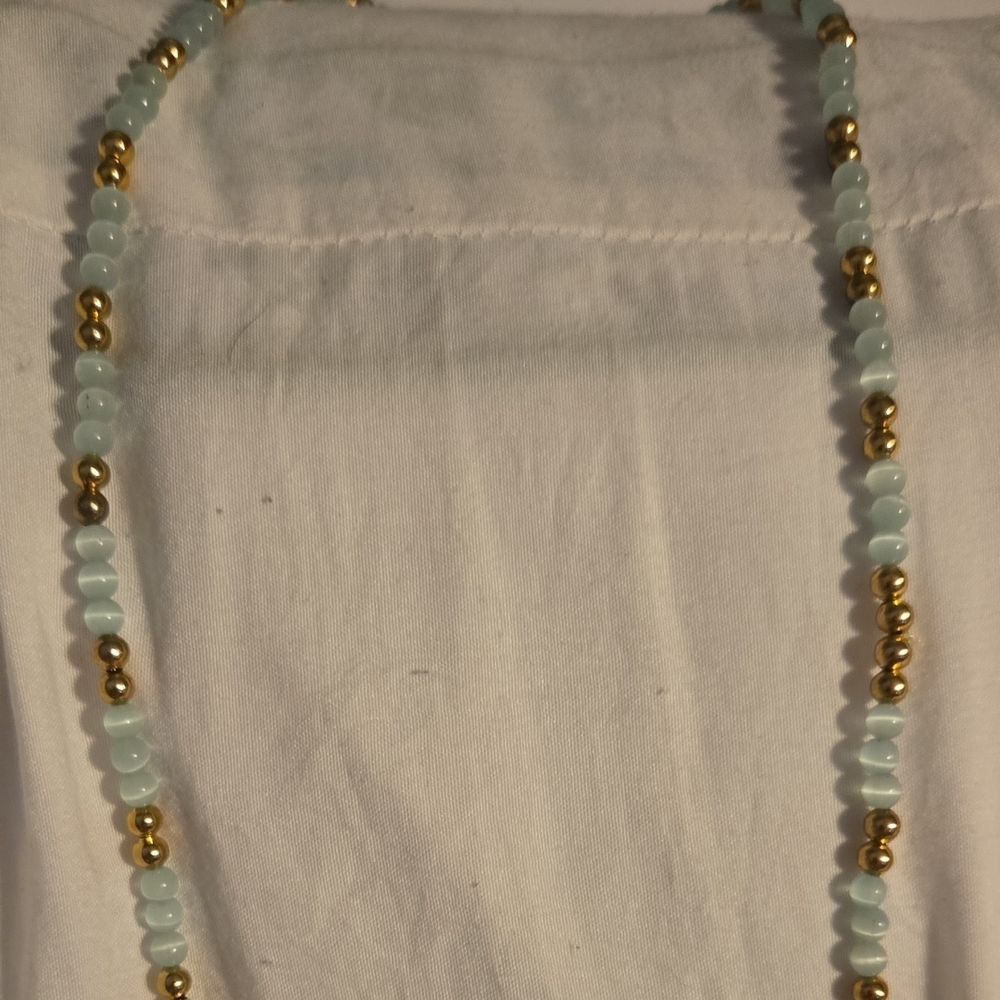 Elegant Gold and Light Blue Beaded Necklace
